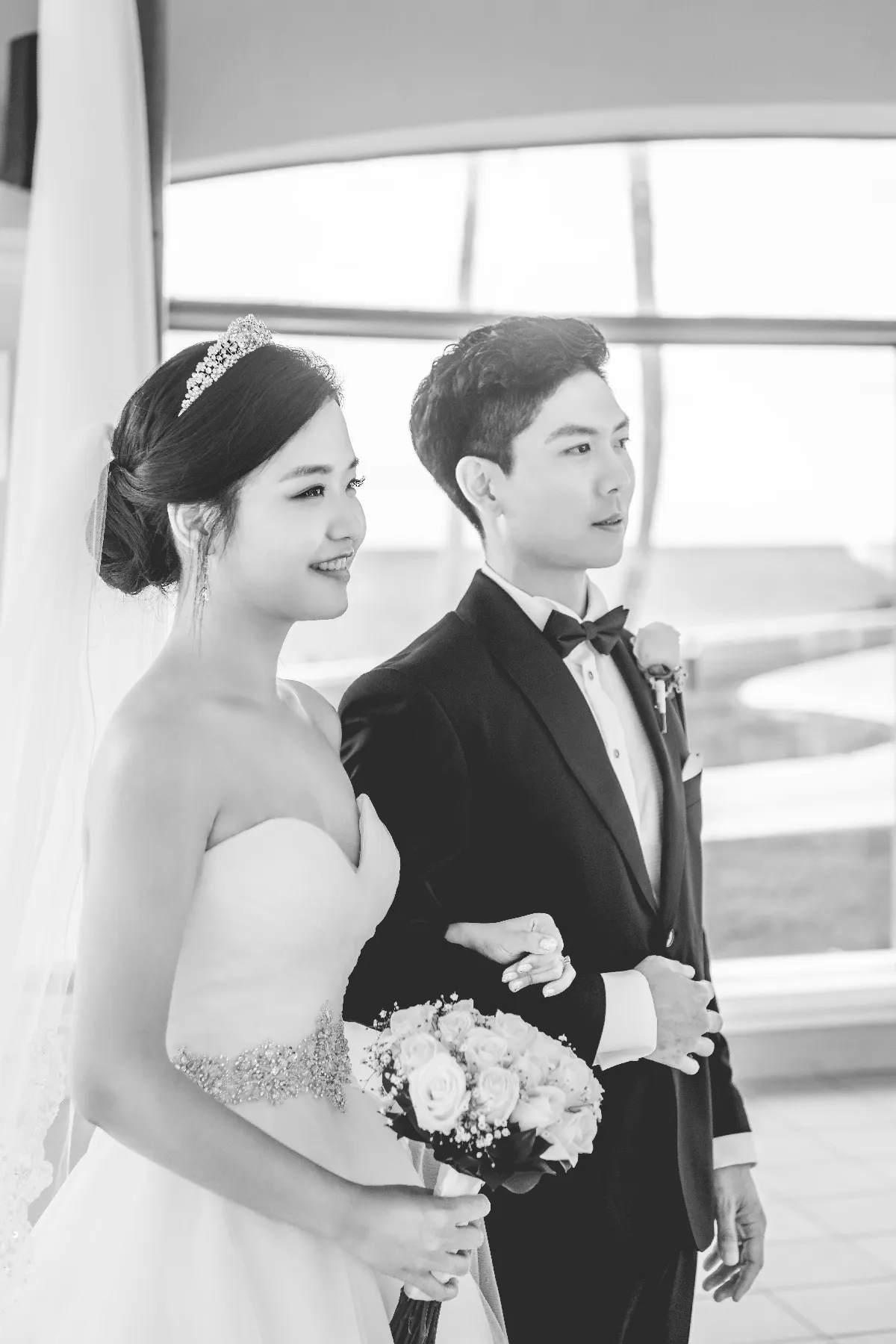 Black-and-white portrait of the couple before the ceremony